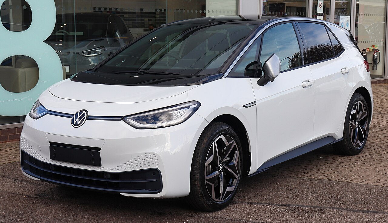 Front view of a compact electric hatchback parked at a kerb